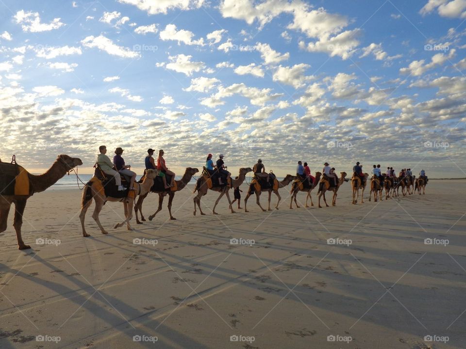 Sissy camel ride Broome WA. A sunset camel ride on the beach in Broome Western Australia 