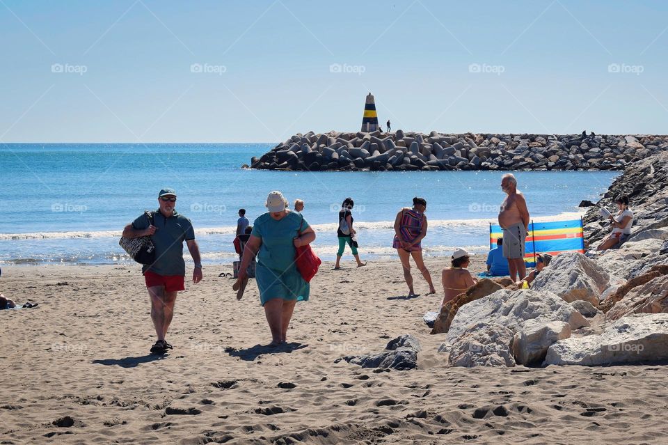 People at the beach in Banalmadena, Malaga, Spain