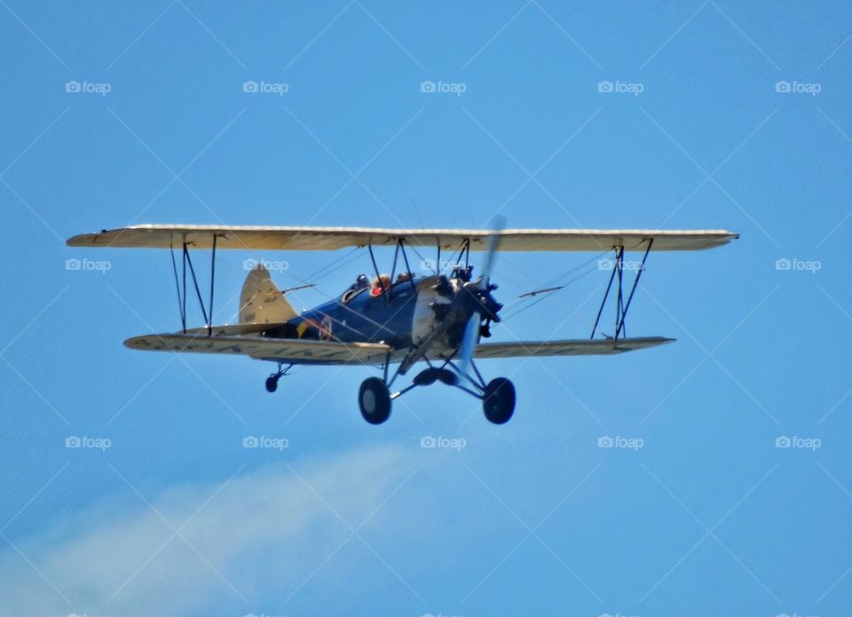 Vintage American Biplane. Classic Stearman Kaydet Blue And Yellow Biplane Aircraft
