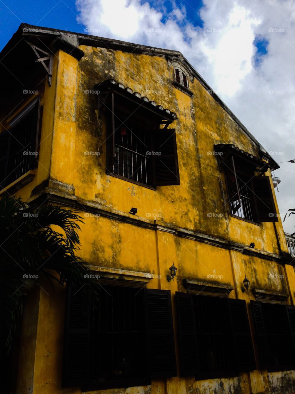 Yellow and blue and white. Yellow house in Hoi An, Vietnam