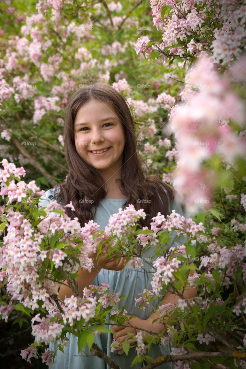 Girl with pink flowers