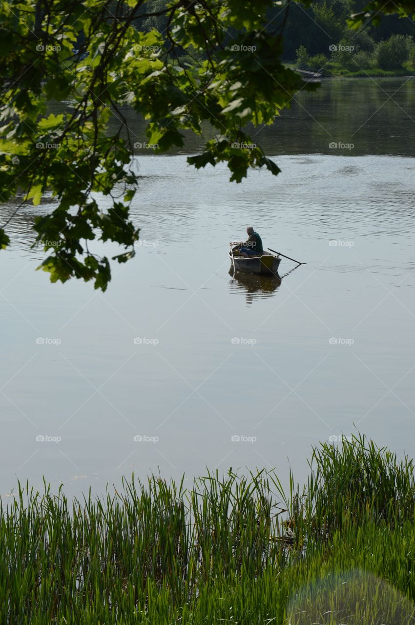 fishermen at river