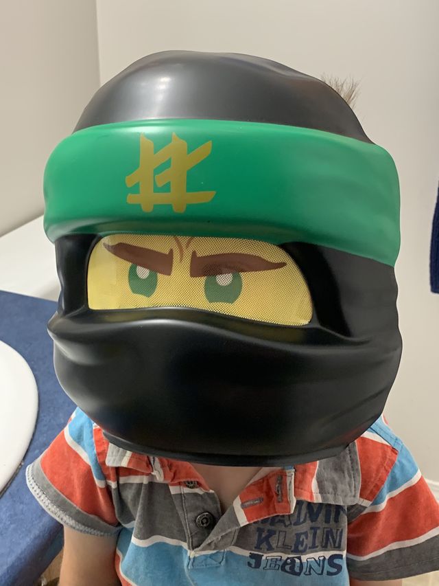 Child with a LEGO mask 