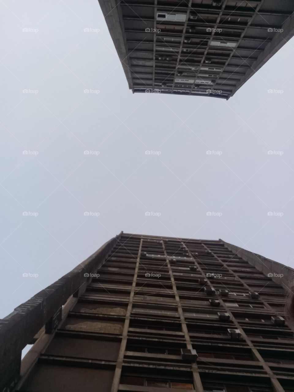 a skyscrapers that are penetrating into the clouds