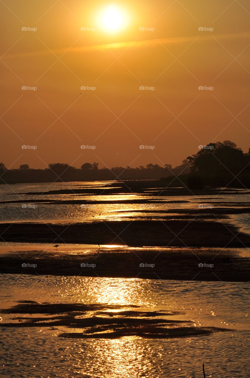 Sun setting on the mighty crocodile river