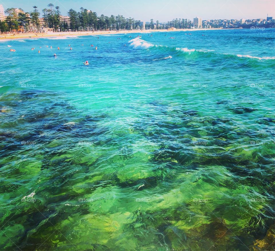 View across the crystal clear water to Manly beach Sydney 