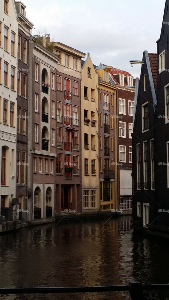 City facade on canal in Amsterdam
