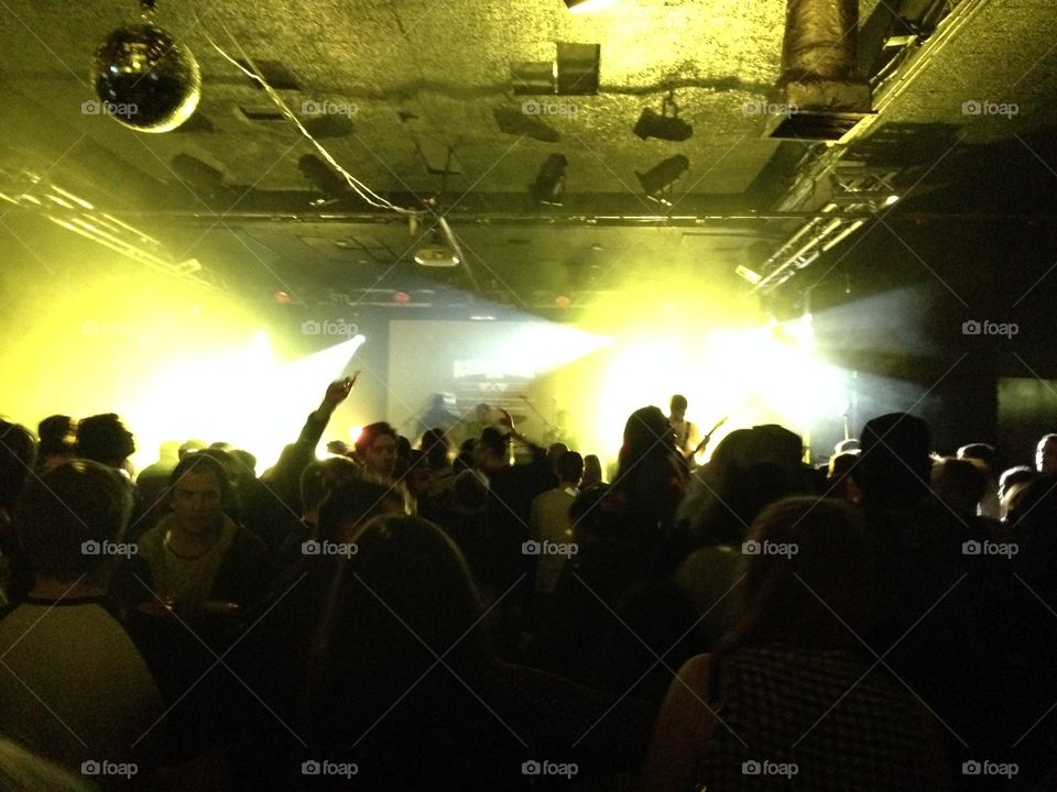 Crowd facing stage at festival 