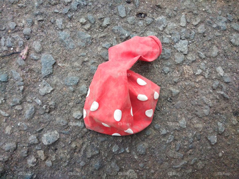 deflated polka dot balloon