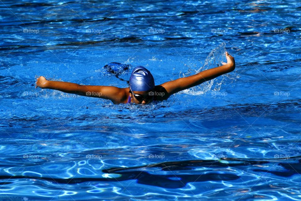 a swimmer in a swimming pool