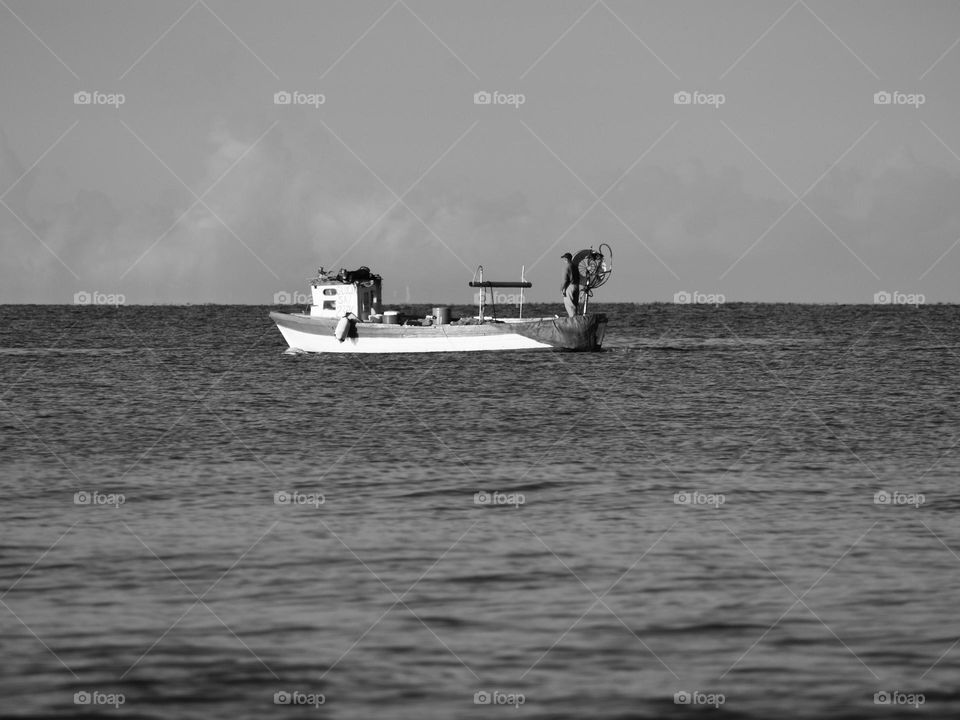 Boat sailing on a calm sea 