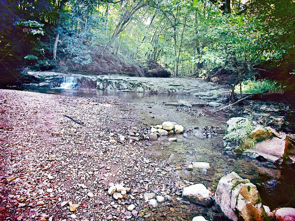 end of the hiking trail leading up to waterfall