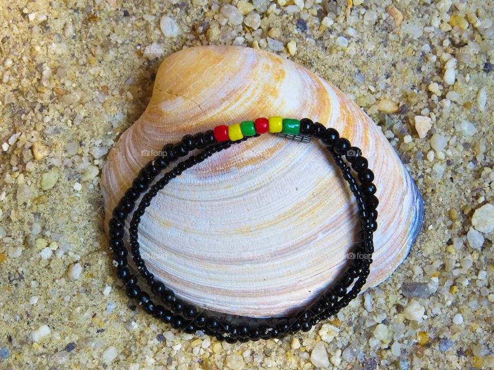 Bracelet on a seashell 