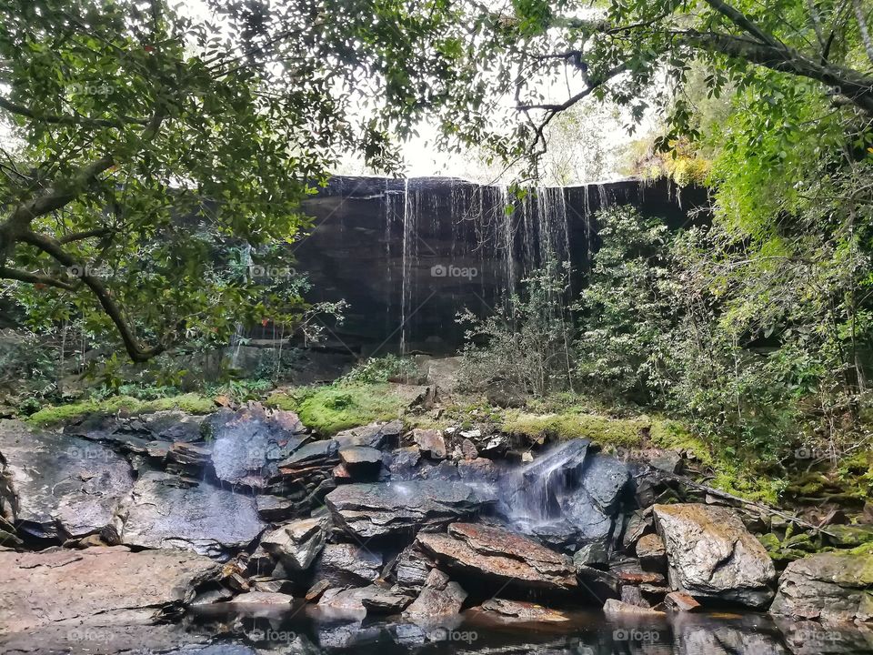 Little waterfall in tropical rainforest, Phukradueng, Thailand.
