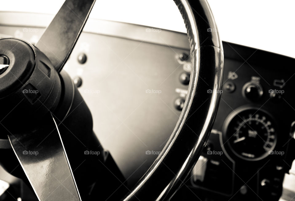 A bus drivers world. Steering wheel and dash of a bus. 