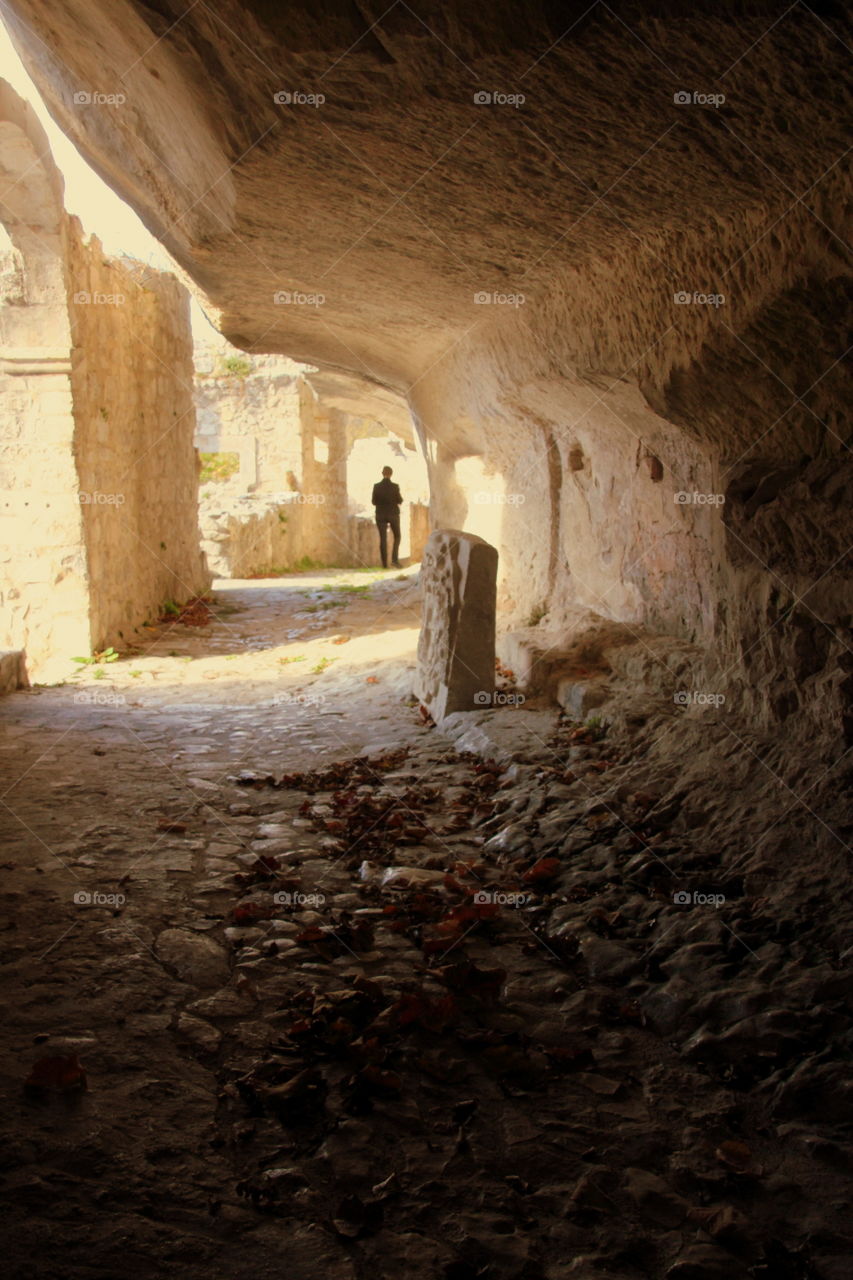 person in an artificial cave