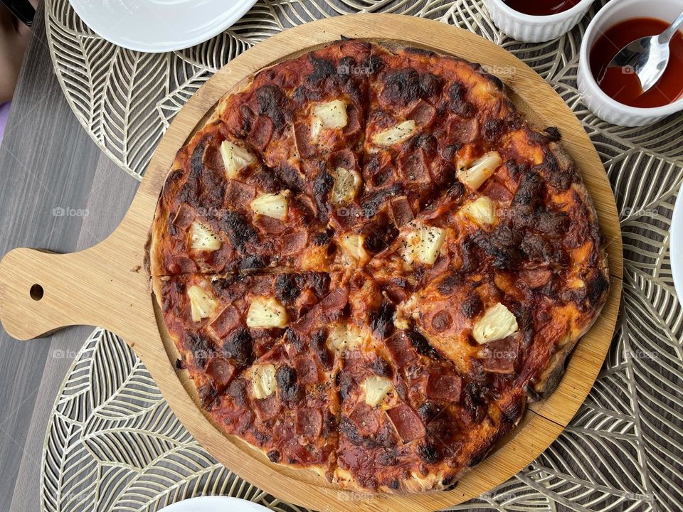 Burnt Hawaiian pizza