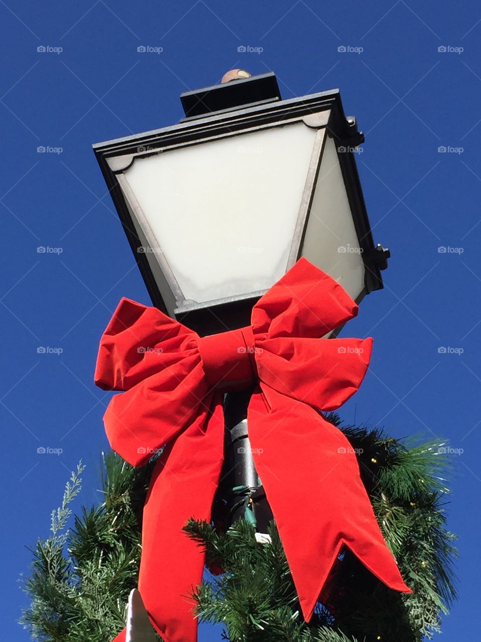 Streetlight decorated festively for Christmas. 