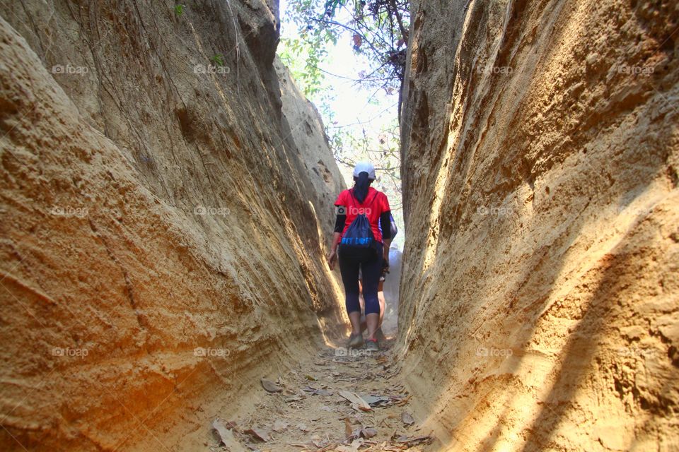 Trekking in the forest. Narrow path for outdoor lovers