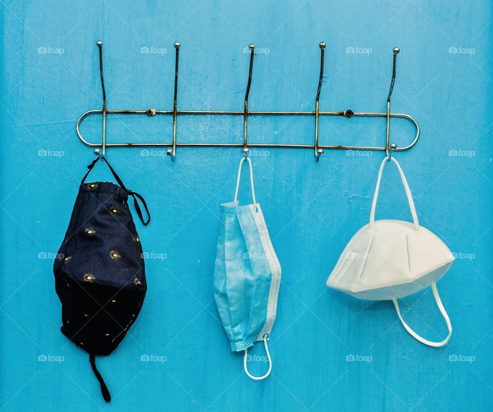 Three types of protective face masks - medical, disposable and textile reusable 