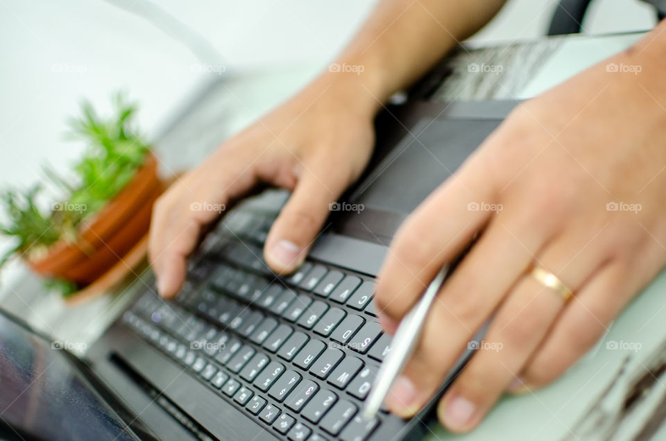 Working hands on notebook. concentration at work!