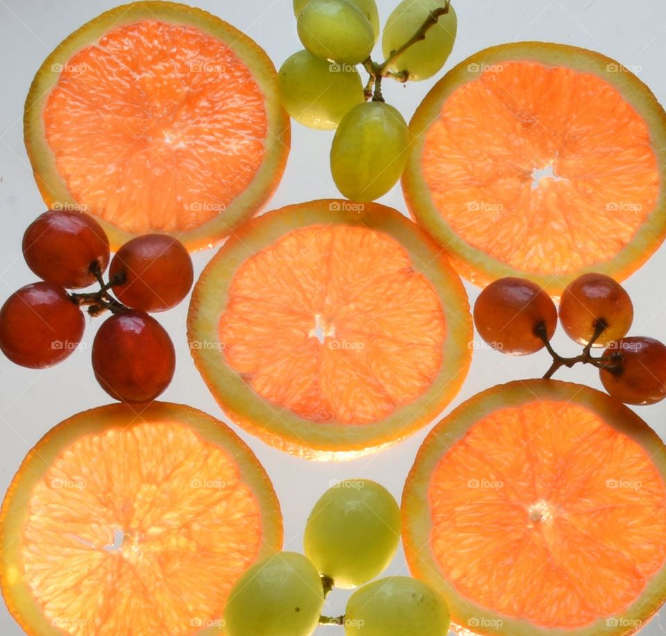 Fruits, oranges and grapes 