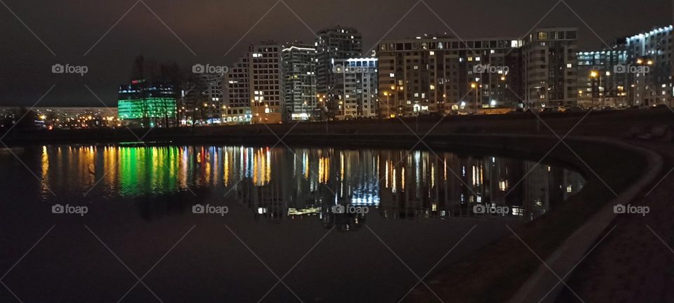 very beautiful night light windows city and reflection