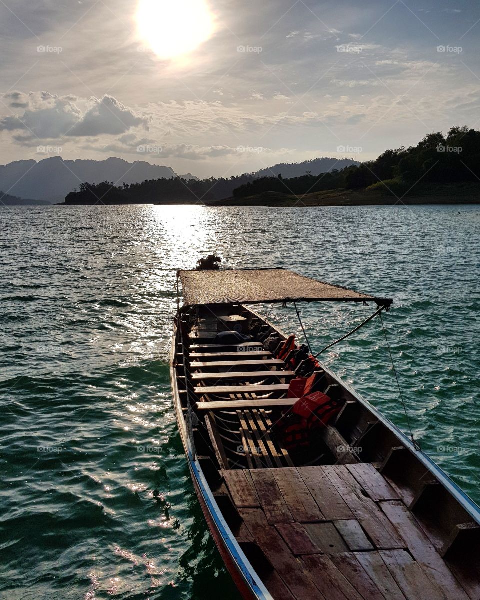 Boat floating on lake