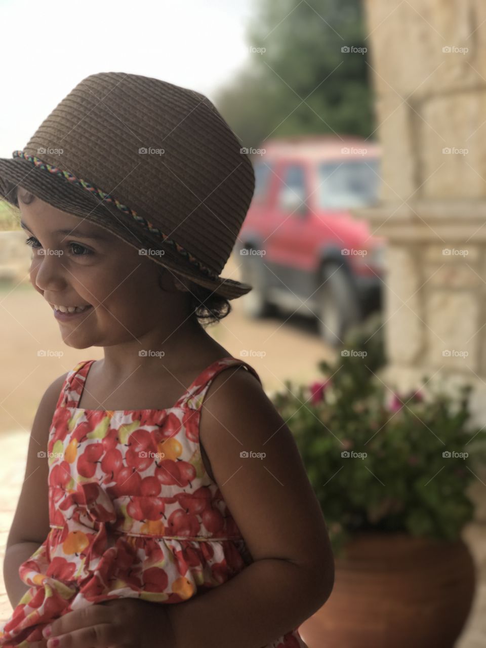 Smiling girl wearing hat