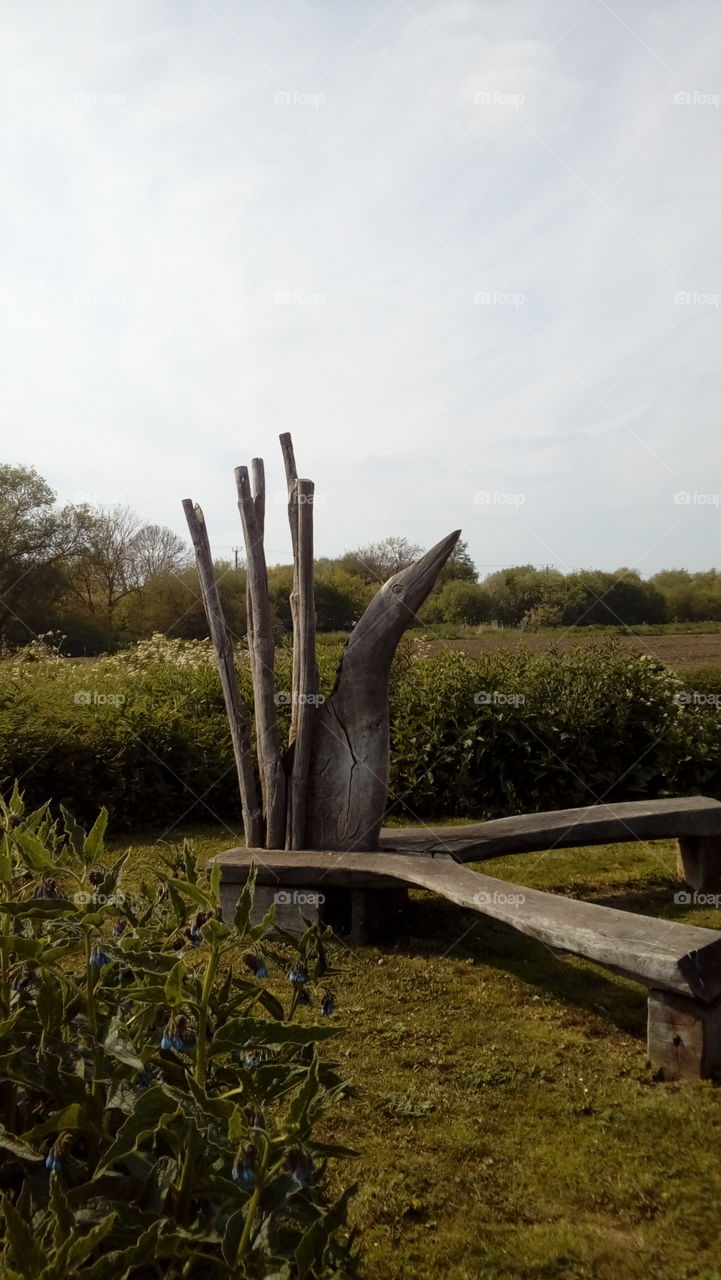 Wooden penguin sculpture
