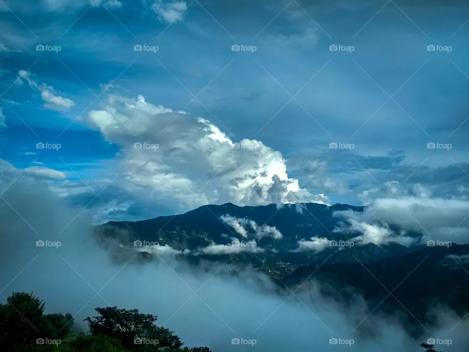 beautiful clouds over mountains
