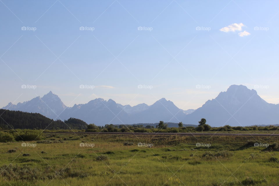 Mountains Mountain View Prairie land field wilderness outdoors daytime scenic summer hiking trees blue sky skies