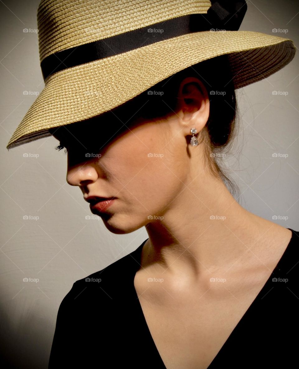 Closeup portrait of a woman in a hat