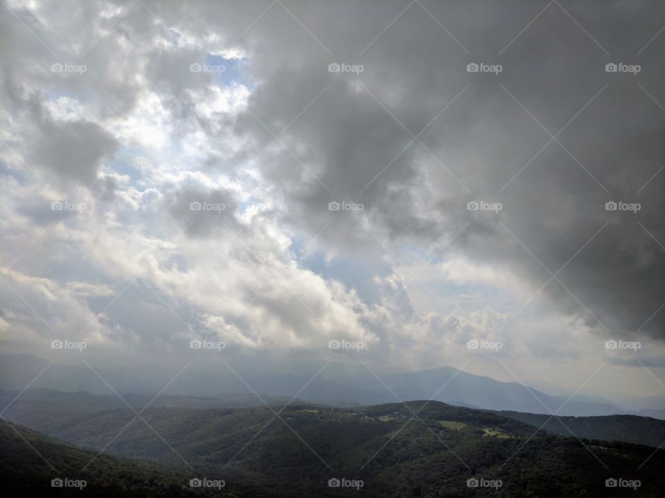 Cloudy Day from Atop Sugar Mountain  In Banner Elk, North Carolina, USA.

Alternate Title: Knocking on the Sky
