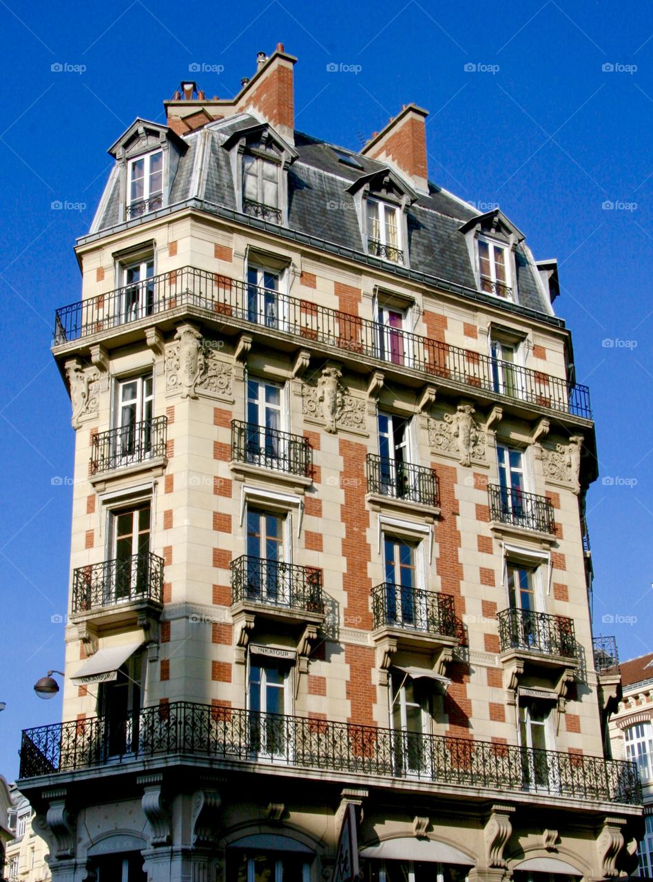 Grand Architecture, a beautiful building in Paris ,photo of a perfect summer day in Paris 