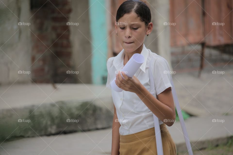 People In Cuba.Young School Girl