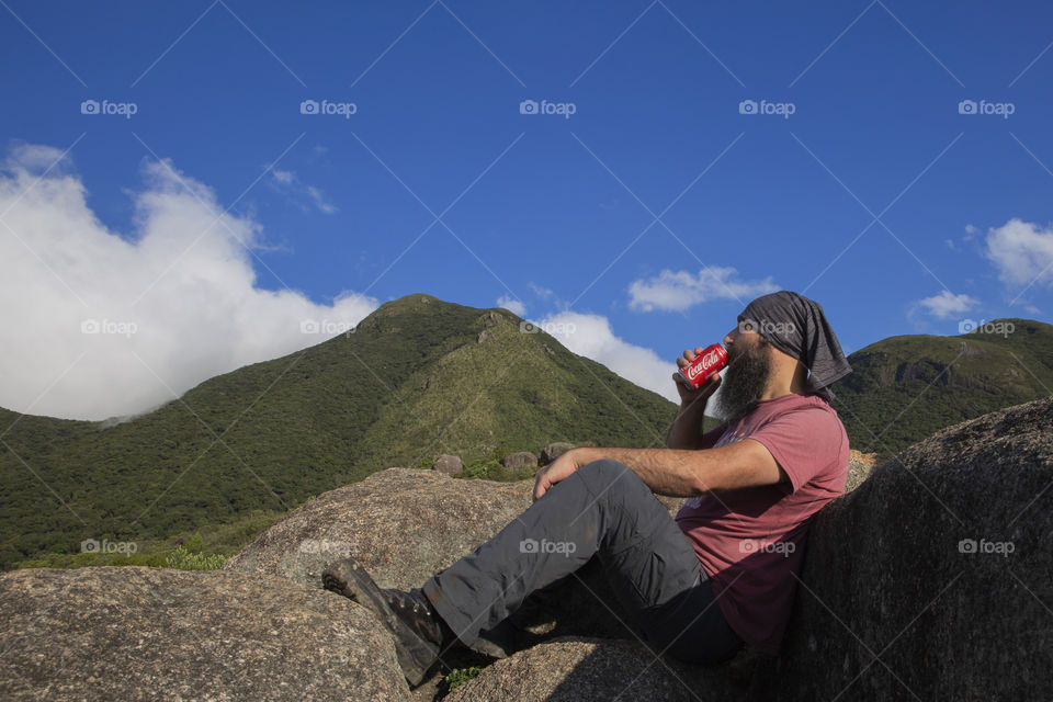 Coca Cola face to face with the mountain.