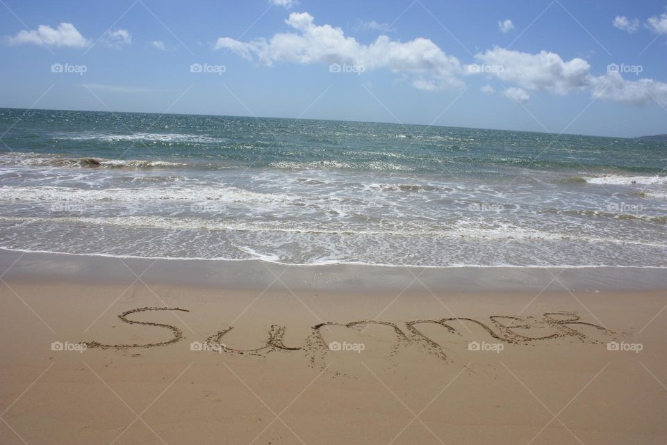 Summer sign on the beach 