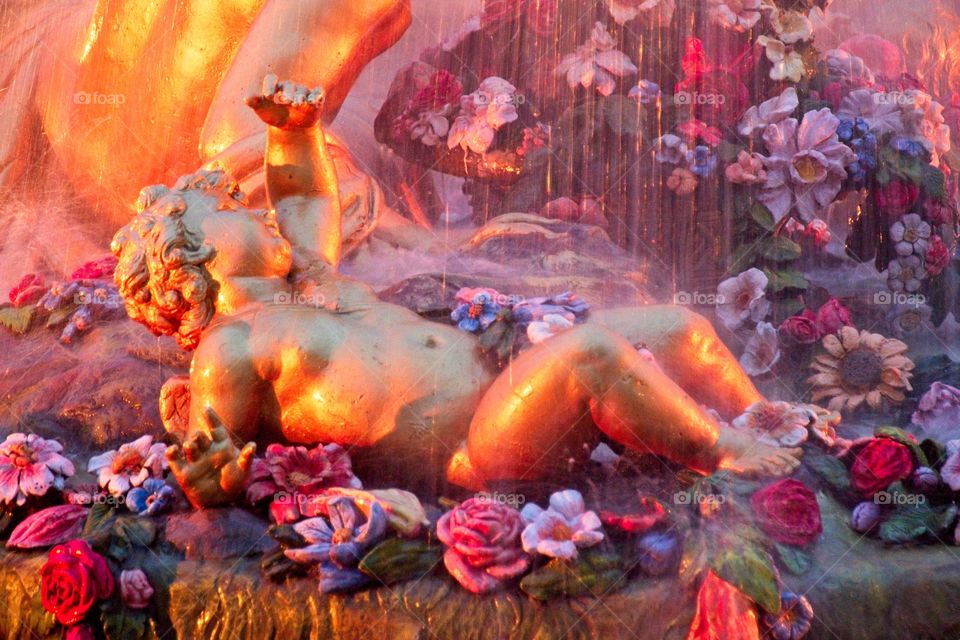 statue of a person in a garden