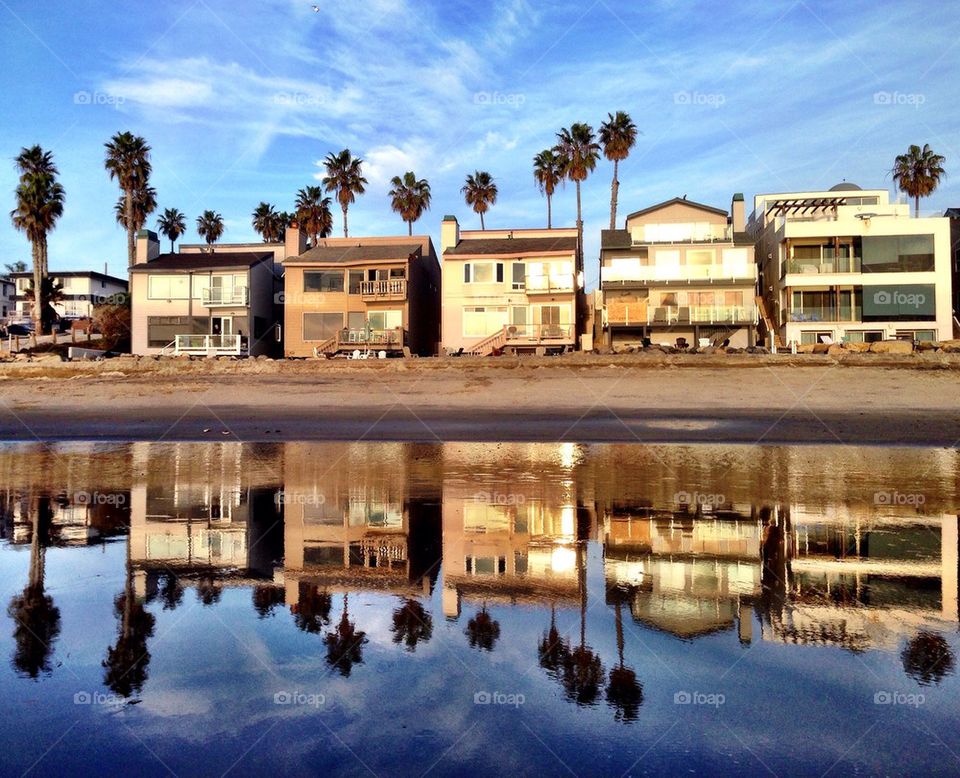 Perfect Reflection. Oceanside, California on the beach. Reflections in the water.