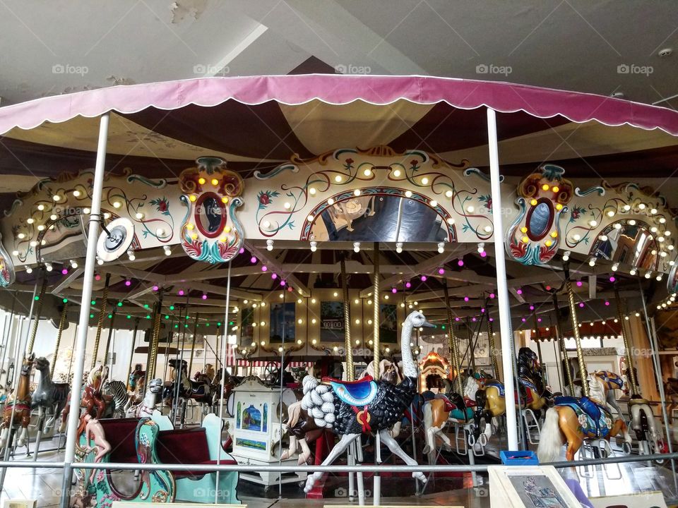 Colorful working carousel inside a museum in Sandusky, Ohio