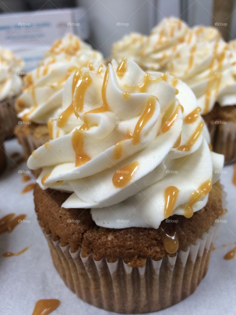 Caramel apple cupcakes. A delicious and moist apple cake with light caramel frosting and drizzle