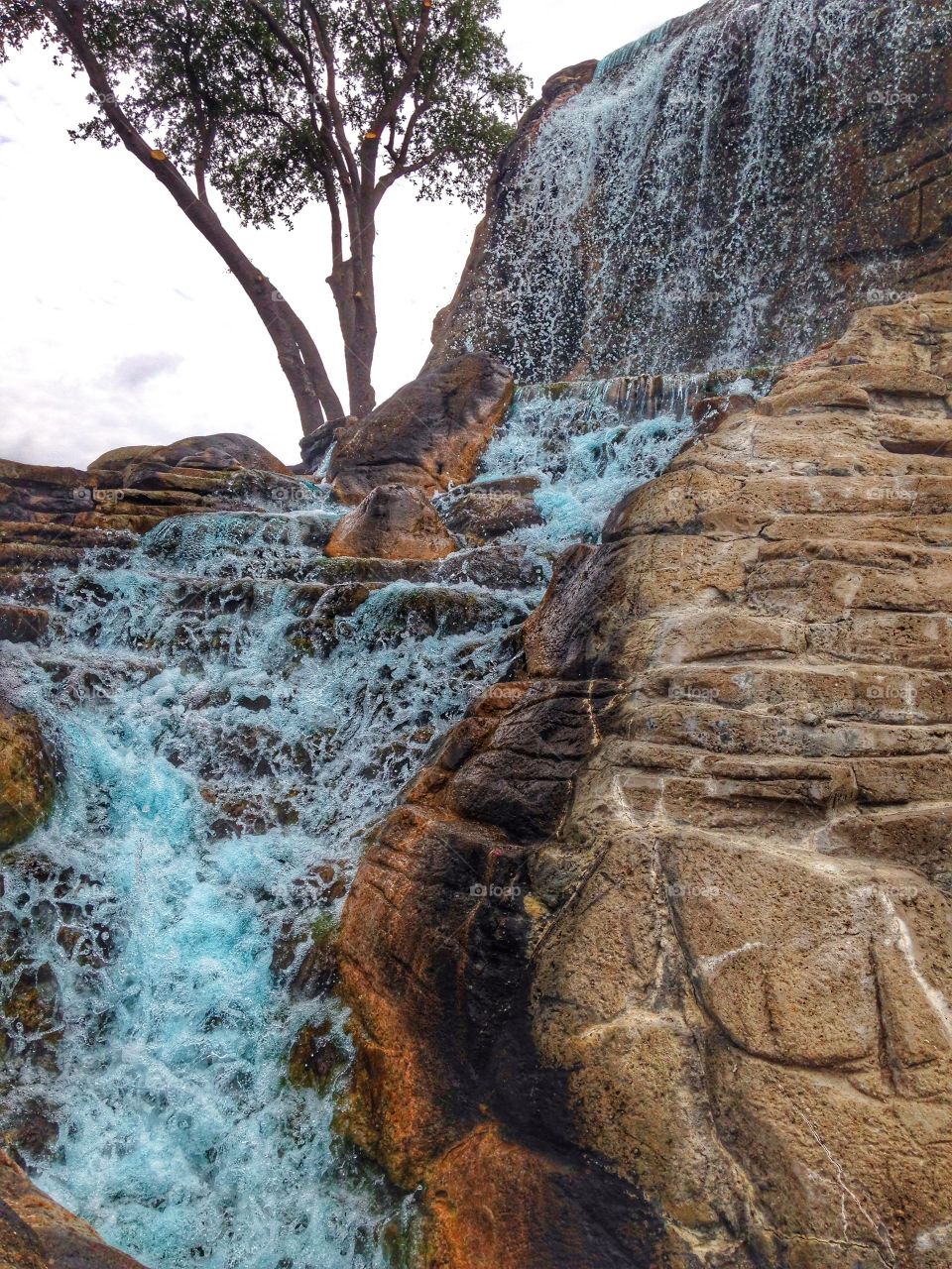 As the water falls. Waterfall at a mini golf course