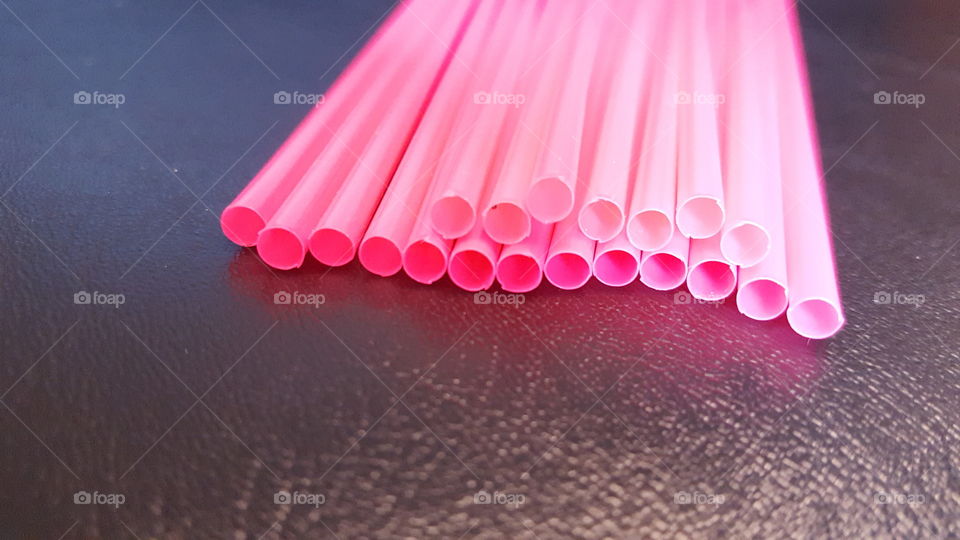 Pink drinking straws