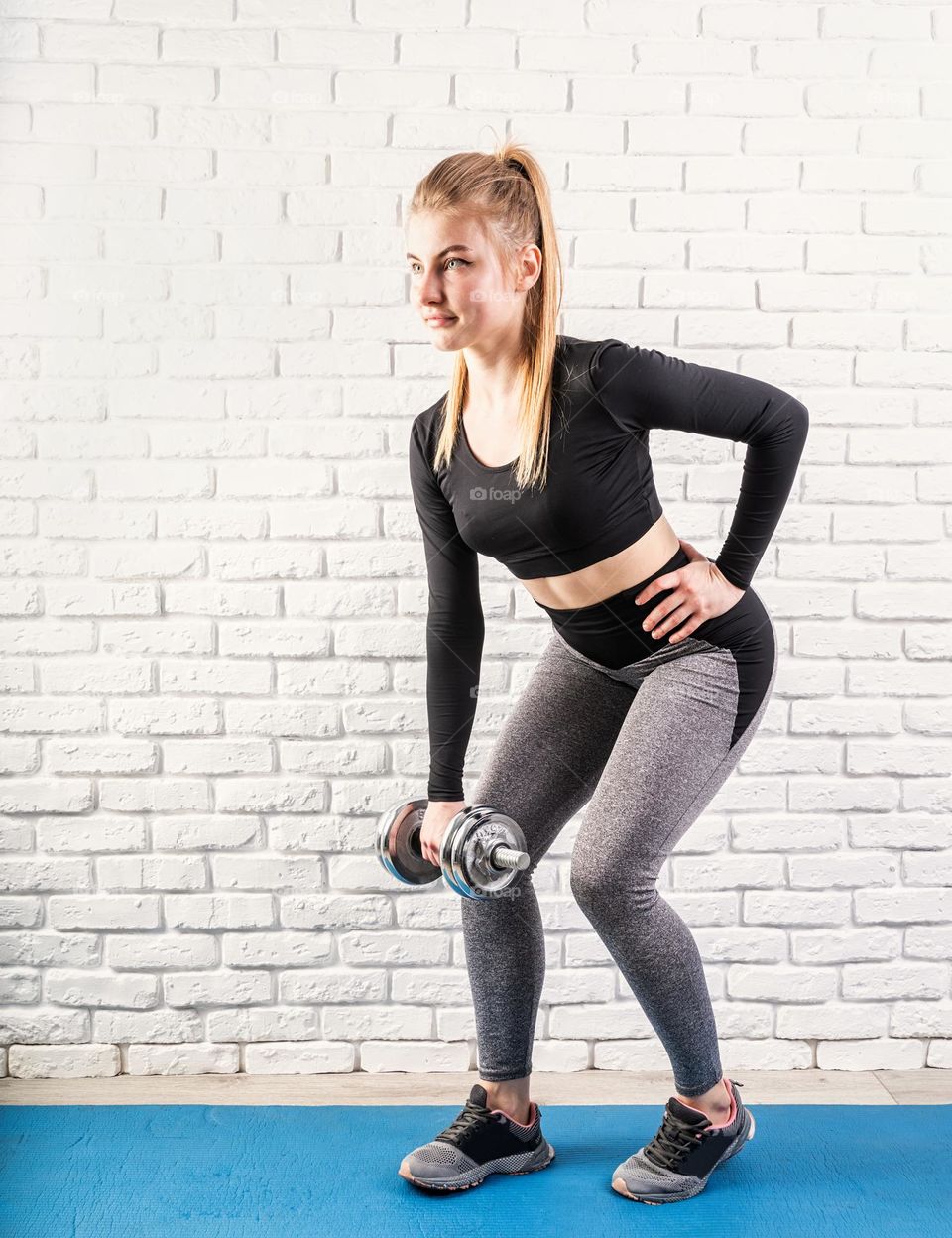 athletic woman working out at home