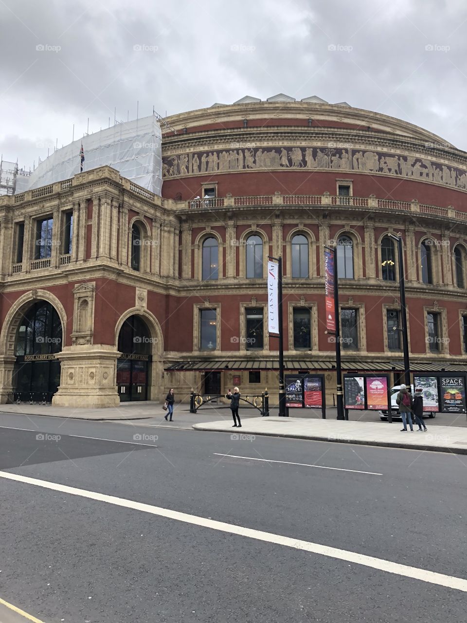 The majestic Royal Albert Hall in London, undergoing some minor renovations at the time. 
