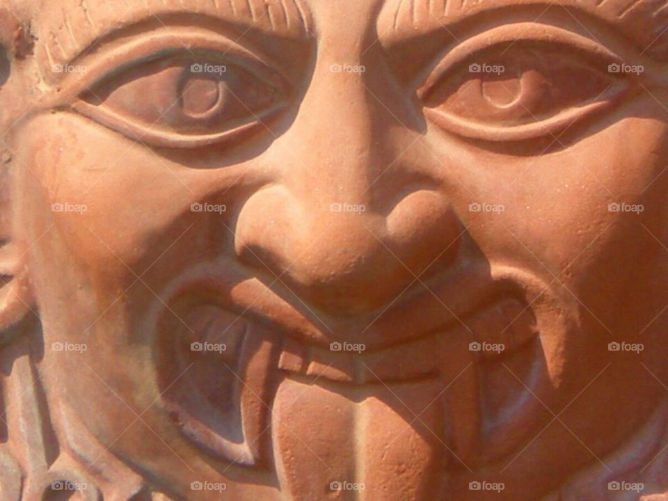Close-up of god sculpture