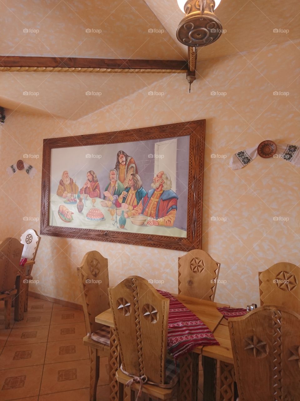 wall painting inside a tradotional romanian restaurant in the mountains