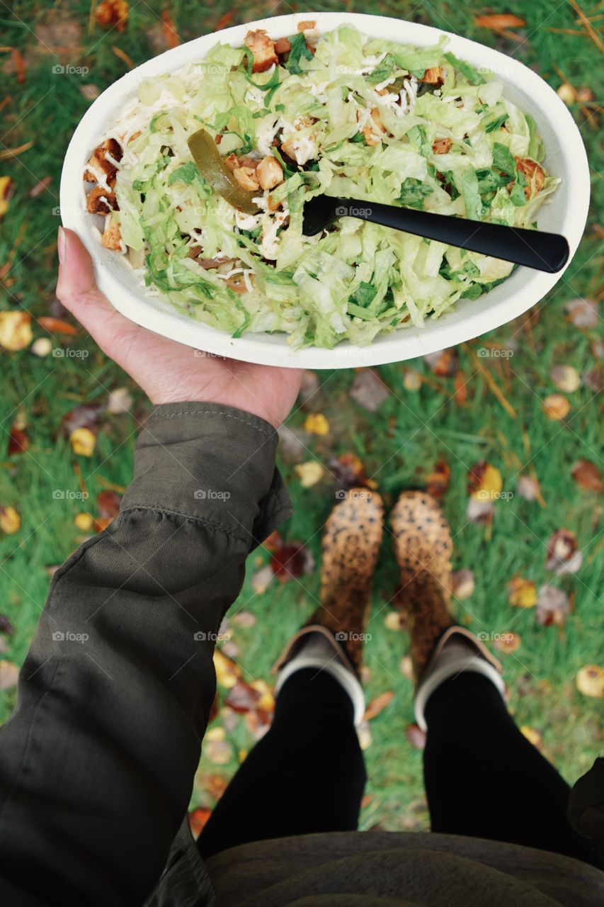 Human hand holding healthy breakfast