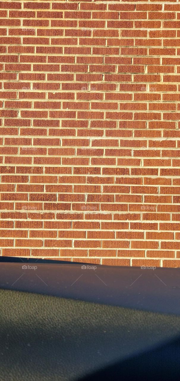 A close view of a brick wall.